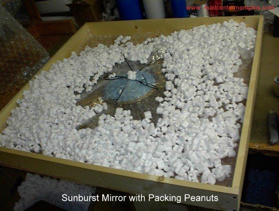 sunburst_mirror_with_packing_peanuts